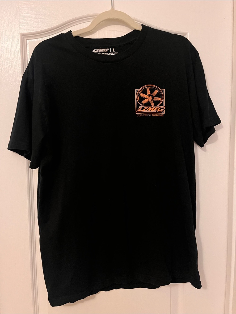 Men's Black Short Sleeve Tee with Orange Emblem